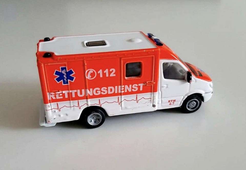 Josh spotted the emergency 112 number on the side of his toy ambulance. (SWNS)