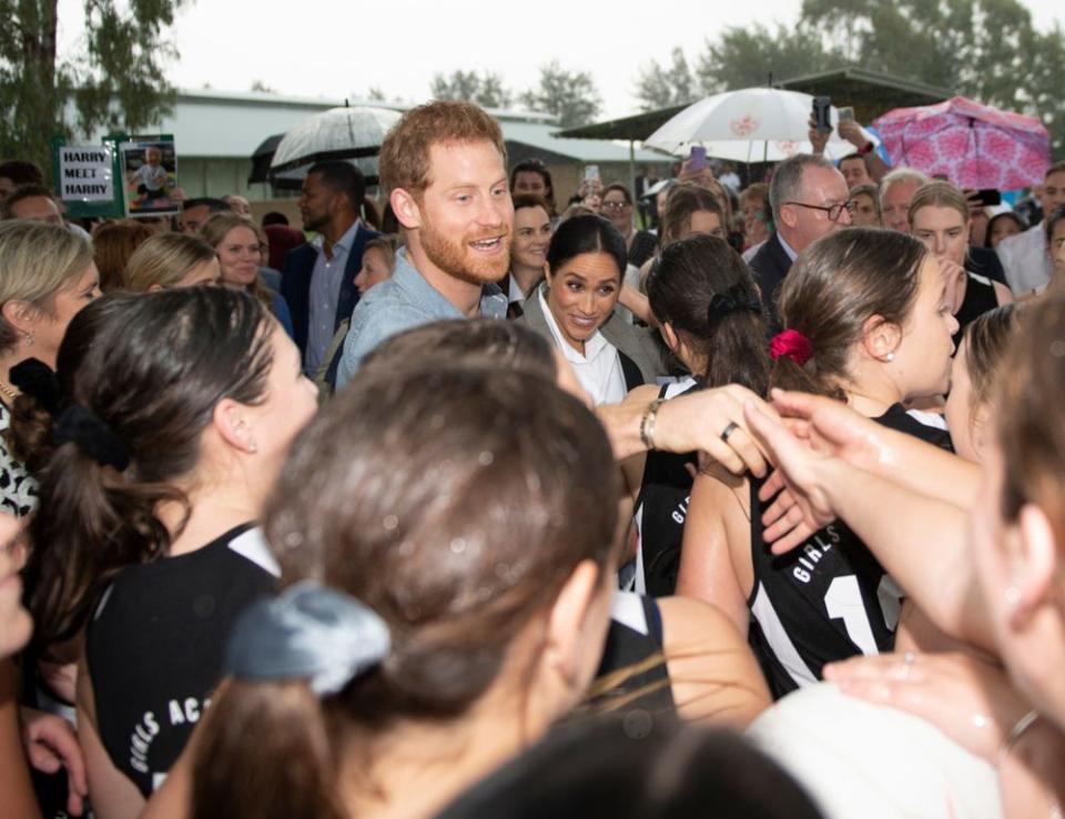 Prince Harry and Meghan Markle meeting students