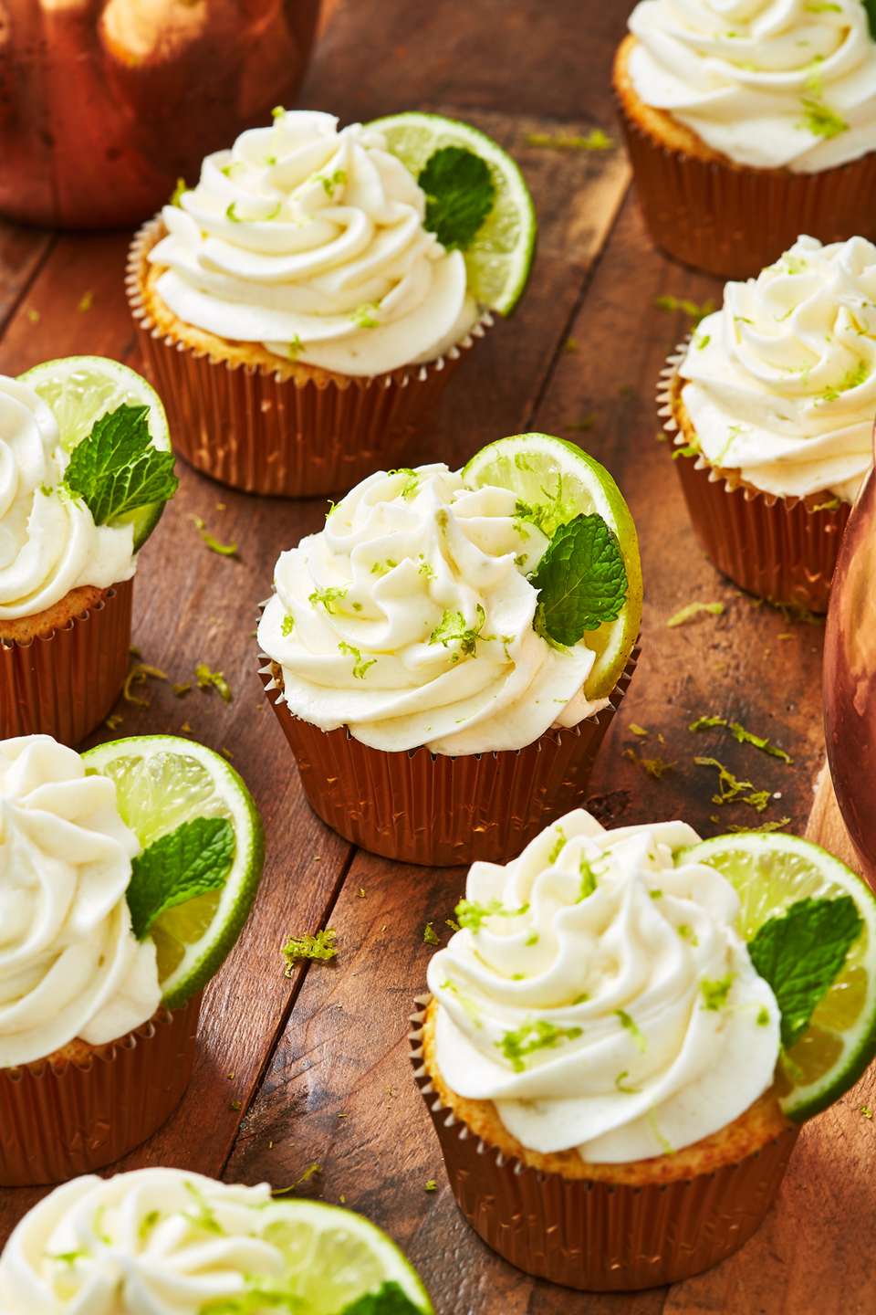 <p>To make these cupcakes really feel like a <a href="https://www.delish.com/cooking/recipe-ideas/recipes/a43535/moscow-mule-recipe/" rel="nofollow noopener" target="_blank" data-ylk="slk:Moscow Mule" class="link rapid-noclick-resp">Moscow Mule</a> in dessert form, we added ginger beer to the cupcake batter. </p><p>Get the recipe from <a href="https://www.delish.com/cooking/recipe-ideas/recipes/a55910/moscow-mule-cupcakes-recipe/" rel="nofollow noopener" target="_blank" data-ylk="slk:Delish" class="link rapid-noclick-resp">Delish</a>.</p>