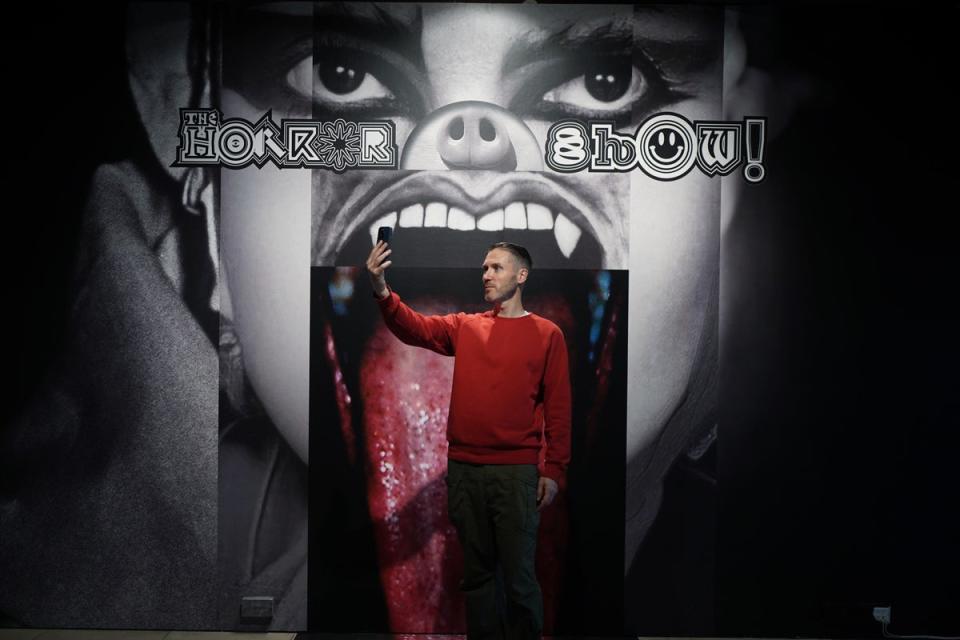 A visitor taking a selfie during the preview for The Horror Show! exhibition at Somerset House, London (Yui Mok/PA) (PA Wire)