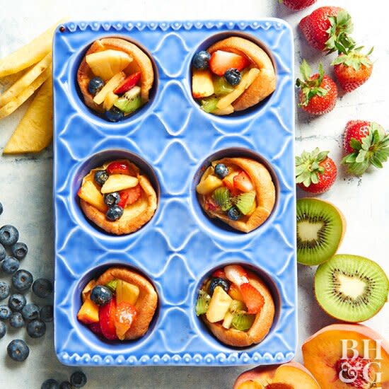 Put your muffin pan to good use -- making pancakes! These puffed oven pancakes are ready in a snap and filled with fresh fruit so you can start your day with a fresh and delicious meal.