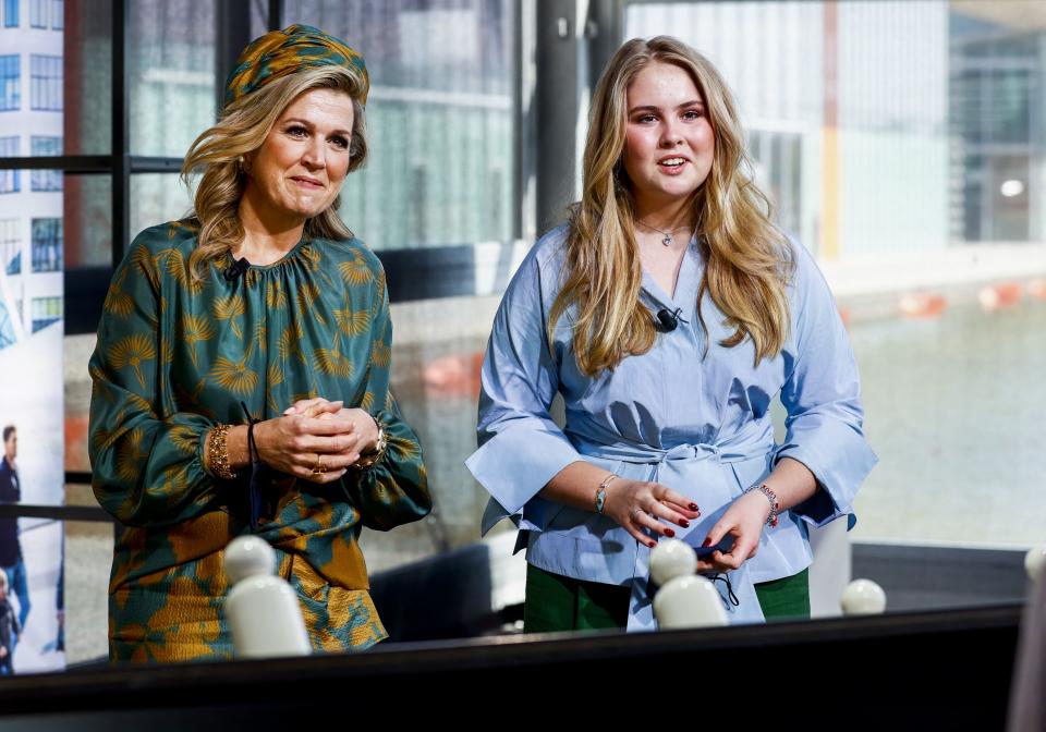 Dutch Queen Maxima (L) and her daughter Amalia sit in the studio of the High Tech Campus, in Eindhoven, on April 27, 2021 during the eighth edition of King's Day. - As many Dutch donned orange to celebrate King's Day, a public holiday to celebrate the monarch's birthday, the Ipsos poll found that confidence in King Willem-Alexander dove from 76 percent in April last year, to 57 percent, a study said on April 27, 2021.
 - Netherlands OUT (Photo by Koen van Weel / ANP / AFP) / Netherlands OUT (Photo by KOEN VAN WEEL/ANP/AFP via Getty Images)