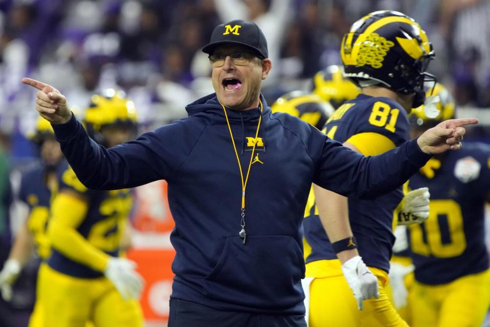 Michigan coach Jim Harbaugh gestures during the Fiesta Bowl against TCU in the College Football Playoff on Dec. 31.