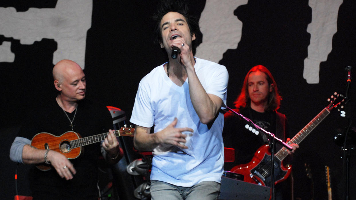  Jimmy Stafford, Patrick Monahan and Jerry Becker of Train perform at Center Stage on December 14, 2010 in Atlanta, Georgia. 