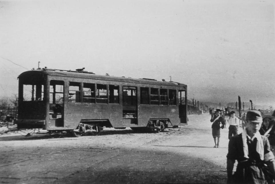 A damaged tram is seen in Hiroshima, western Japan, on Aug. 9, 1945, three days after the first U.S. atomic bomb destroyed the city. (Mitsunobu Kishida/Kyodo News via AP)