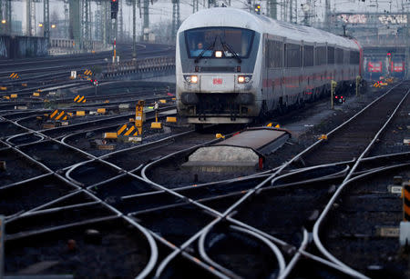 FILE PHOTO: A locomotive engine of German railway Deutsche Bahn is seen at the main train station in Frankfurt, Germany, March 27, 2019. REUTERS/Kai Pfaffenbach/File Photo