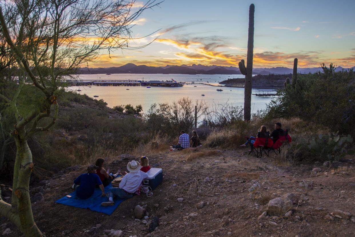 People will be going outside to watch the sunset as they wait for the fireworks to begin during Fourth of July weekend.