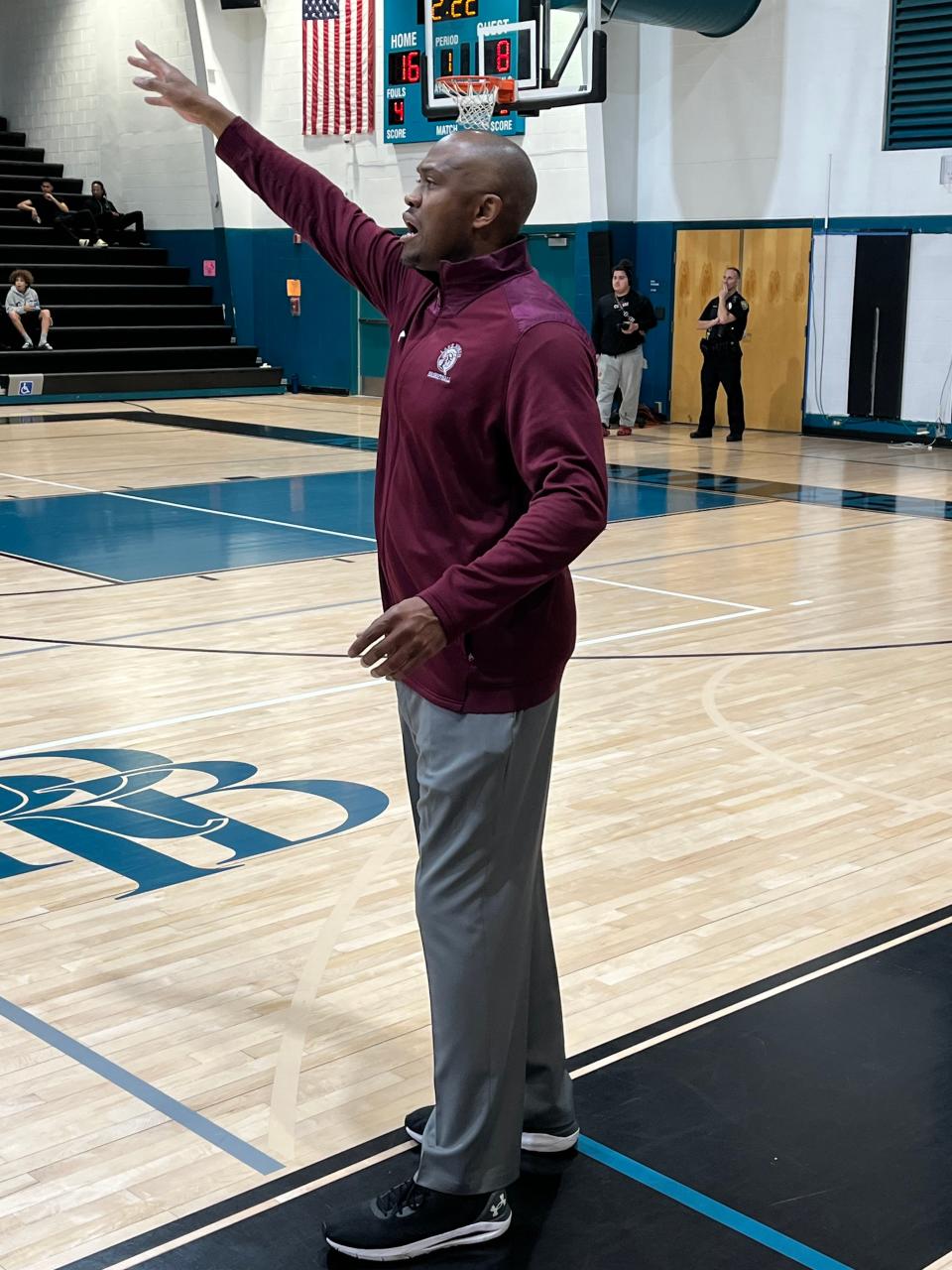 Lake Worth coach Frank Baxley shouts instructions to his team during the first half Saturday night in the District 8-7A championship game.