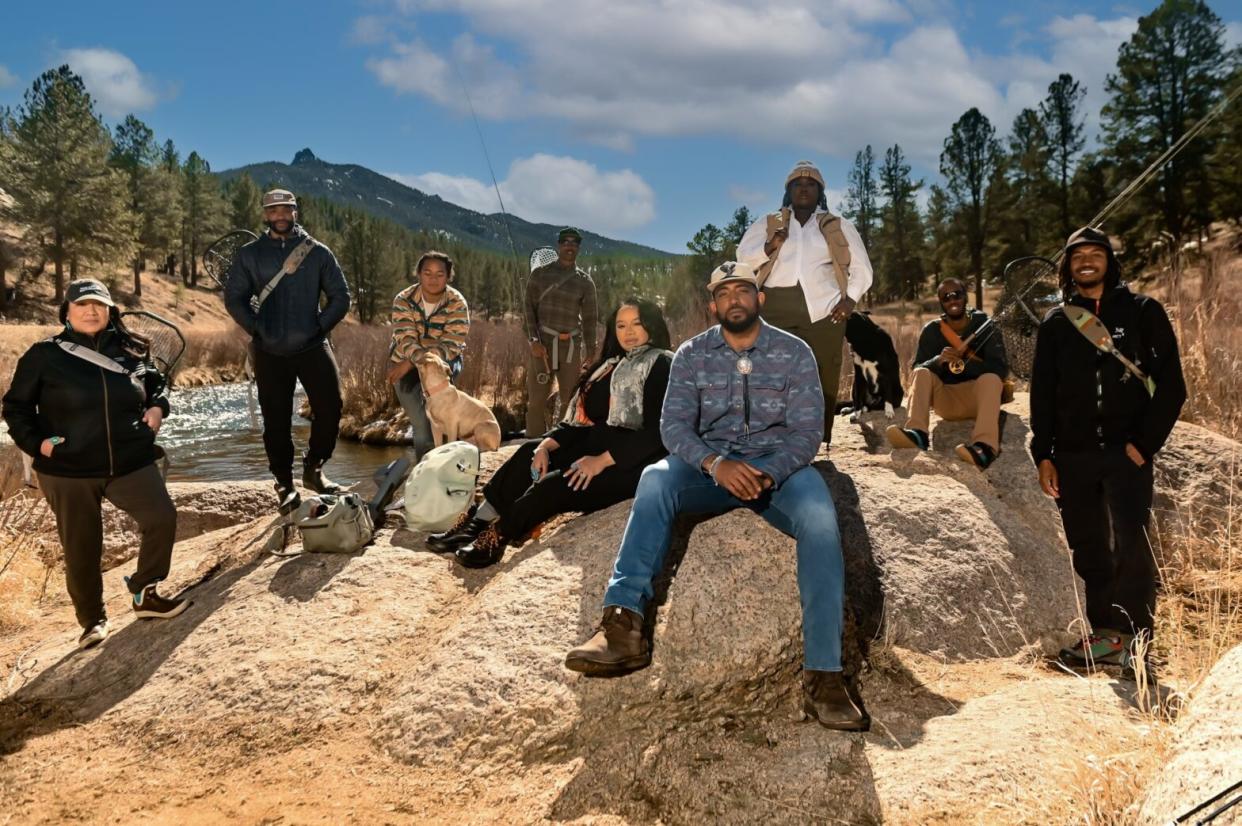 group of people posing representing Wanderland Outdoors in Colorado