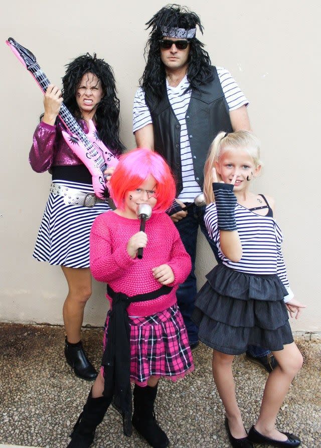 <p>Get ready to bang your head with this 80s hair metal rock band costume for the whole family that's easy to put together and just as inexpensive. All it takes is a quick trip to your local thrift shop and you'll be ready to rock and roll all night.</p><p><strong>Get the tutorial at <a href="https://designimprovised.com/2017/10/family-halloween-costume-idea-80s-rock.html" rel="nofollow noopener" target="_blank" data-ylk="slk:Design Improvised;elm:context_link;itc:0;sec:content-canvas" class="link ">Design Improvised</a>.</strong></p><p><a class="link " href="https://go.redirectingat.com/?id=74968X1525072&xs=1&url=https%3A%2F%2Fwww.walmart.com%2Fip%2FInflatable-Guitar-40in-1-pkg%2F45696497&sref=https%3A%2F%2Fwww.countryliving.com%2Fdiy-crafts%2Fg23785711%2Flast-minute-halloween-costumes%2F&xcust=%5Butm_source%7C%5Butm_campaign%7C%5Butm_medium%7C%5Bgclid%7C%5Bmsclkid%7C%5Bfbclid%7C%5Brefdomain%7C%5Bcontent_id%7C08dfaf33-4f64-4c8c-ba7c-9f9efd25bb54%5Bcontent_product_id%7C5ee2921c-bdb6-40dc-a099-f087f56da788%5Bproduct_retailer_id%7C" rel="nofollow noopener" target="_blank" data-ylk="slk:SHOP INFLATABLE GUITARS;elm:context_link;itc:0;sec:content-canvas">SHOP INFLATABLE GUITARS</a></p>