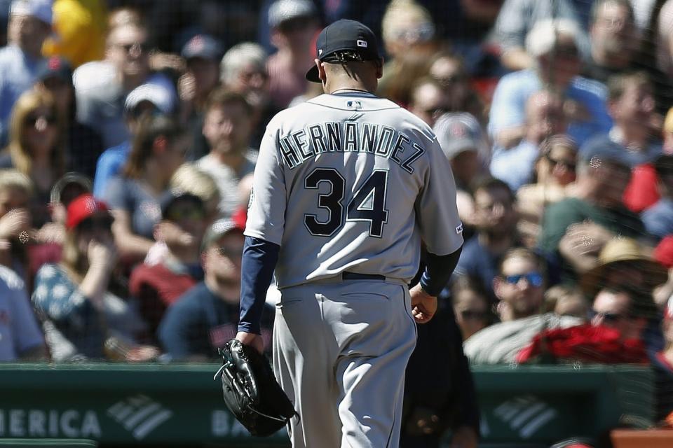 Seattle Mariners' Felix Hernandez walks off the field after being relieved during the third inning of a baseball game against the Boston Red Sox in Boston, Saturday, May 11, 2019. (AP Photo/Michael Dwyer)