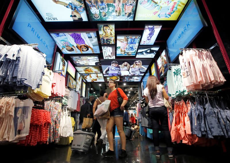 FILE PHOTO: Customers shop at a Primark store on Oxford Street in London