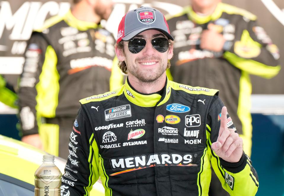 Ryan Blaney celebrates after winning the FireKeepers Casino 400 Sunday at Michigan International Speedway.