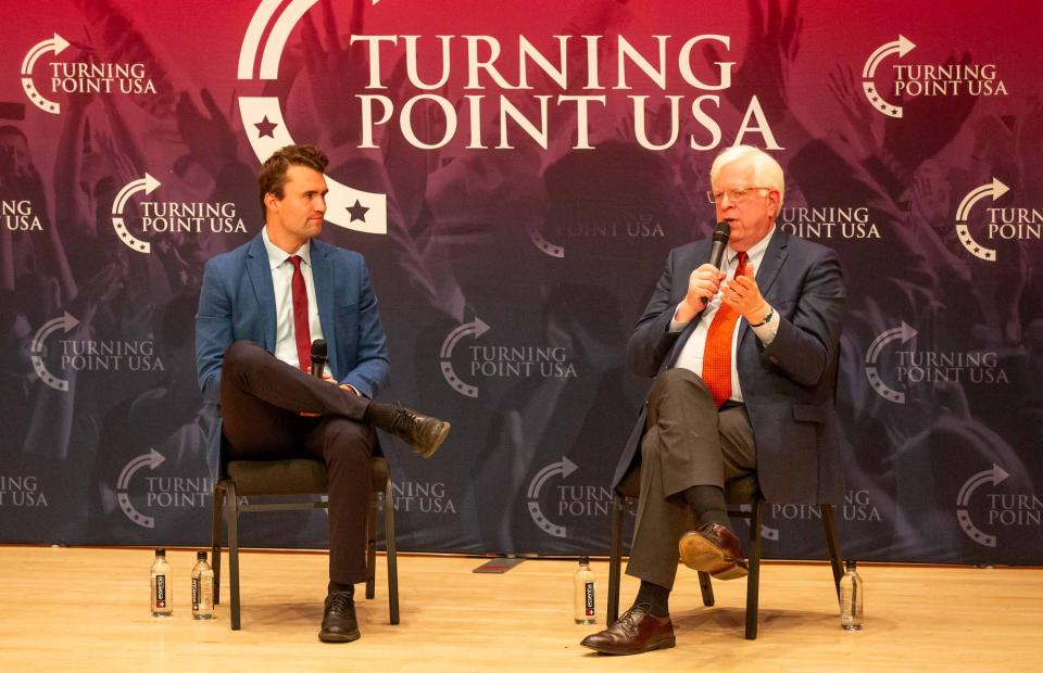 Charlie Kirk (left) and Dennis Prager during a Turning Point USA event at the ASU Katzin Concert Hall in Tempe on Sept. 27, 2023.