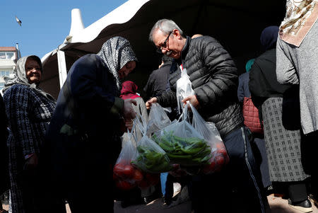 People shop at a tent set up by the municipality in the Bayrampasa district of Istanbul, Turkey, February 11, 2019. REUTERS/Murad Sezer