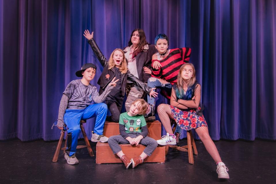 Playing the outrageous Herdman family in the Falmouth Theatre Guild production of "The Best Christmas Pageant Ever" are, from left, Howard Dubner, Caroline Sullivan, Lexi Davignon (top), Ash Bossi, Darcey Wankel, and P.J. Berube (center, seated).