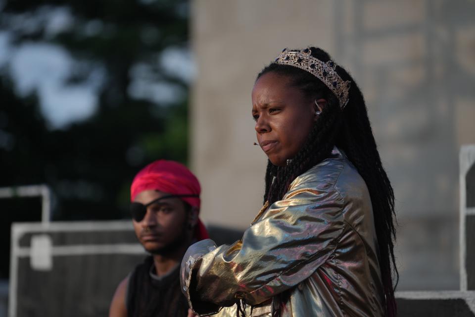 Shawnté P. Gaston and Chinyelu Mwaafrika listen to instructions during a dress rehearsal for "Ricky 3 — a hip-hop Shakespeare Richard III" at Taggart Memorial Amphitheater Tuesday, July 19, 2022, in Indianapolis.