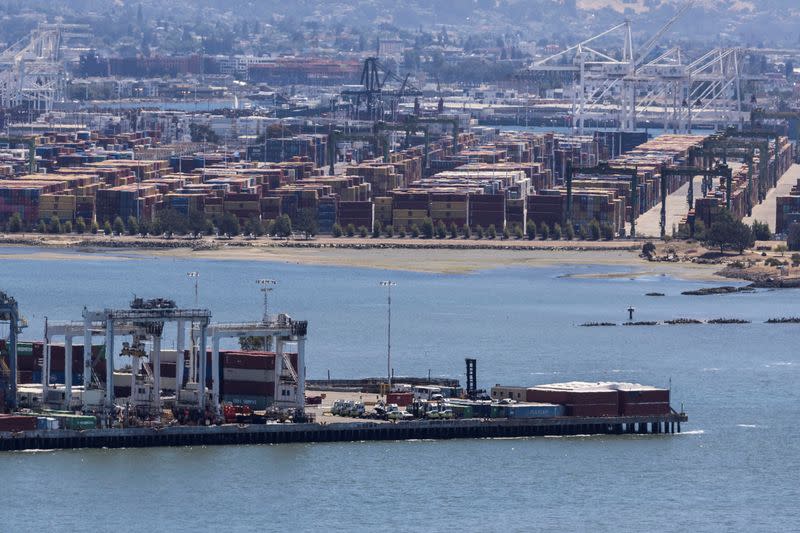 Shipping containers are seen at a terminal inside the Port of Oakland, California