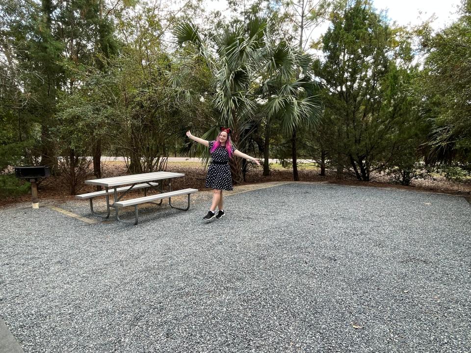 the writer in spacious campsite with concrete and trees