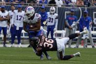 Buffalo Bills' Marcell Ateman (15) is tackled by Chicago Bears' Kendall Williamson during the second half of an NFL preseason football game, Saturday, Aug. 26, 2023, in Chicago. (AP Photo/Nam Y. Huh)