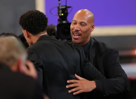 Jun 22, 2017; Brooklyn, NY, USA; Lonzo Ball (UCLA) celebrates with his father LaVar Ball after being introduced as the number two overall pick to the Los Angeles Lakers in the first round of the 2017 NBA Draft at Barclays Center. Mandatory Credit: Brad Penner-USA TODAY Sports