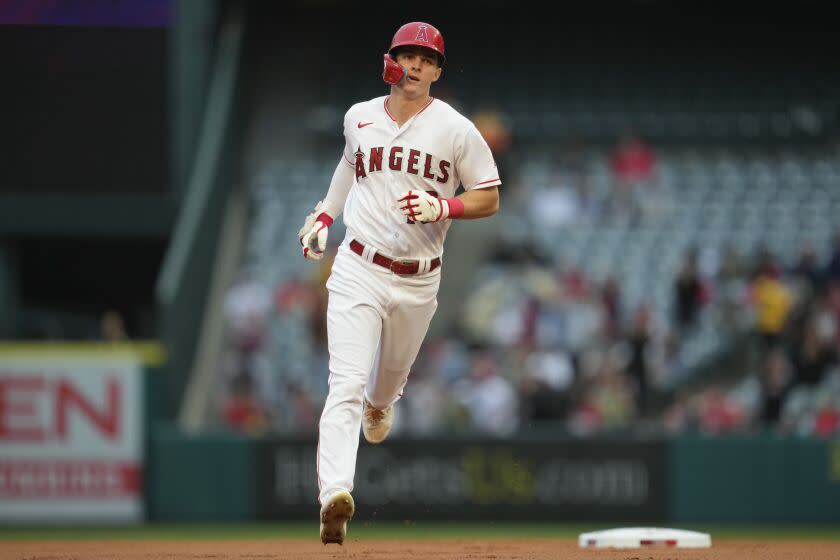 Los Angeles Angels'  Mickey Moniak (16) runs the bases after hitting a home run during the first inning of a baseball game against the Boston Red Sox in Anaheim, Calif., Tuesday, May 23, 2023. (AP Photo/Ashley Landis)