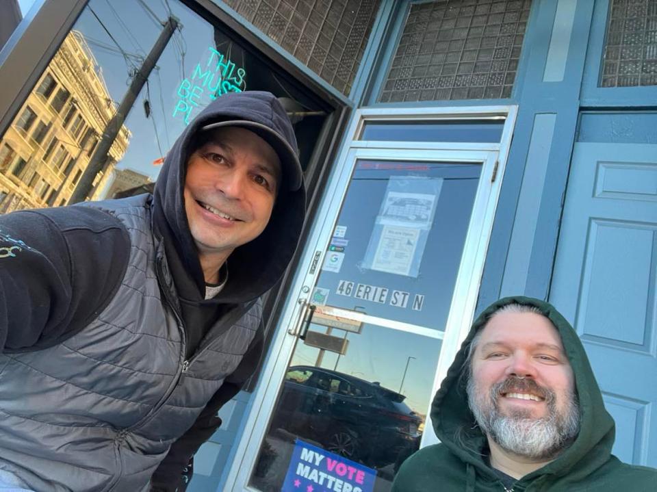 Ed Balint, The Canton Repository's entertainment writer, is shown with a fellow music fan who was waiting in line for Erie St Vinyl in downtown Massillon to open for the recent Small Business Saturday, which featured special Record Store Day exclusive releases.