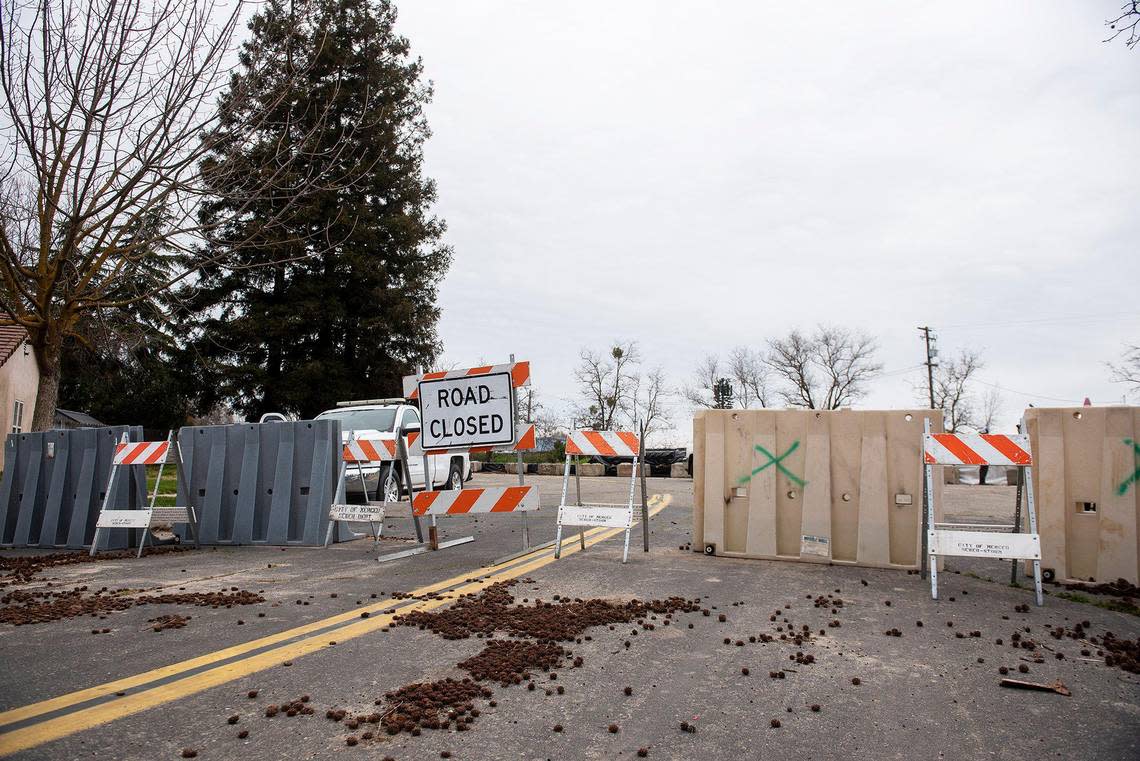 West North Bear Creek Drive is closed near the intersection with Driftwood Drive, in Merced, Calif., on Thursday, March 9, 2023.