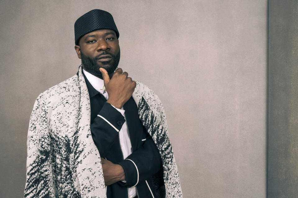 Blitz Bazawule poses for a portrait to promote the film "The Color Purple" on Thursday, Dec. 7, 2023, in Los Angeles. (Photo by Willy Sanjuan/Invision/AP)