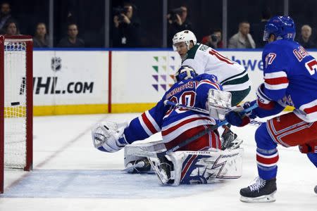 Feb 21, 2019; New York, NY, USA; Minnesota Wild left wing Zach Parise (11) scores a goal past New York Rangers goaltender Henrik Lundqvist (30) during the third period at Madison Square Garden. Mandatory Credit: Adam Hunger-USA TODAY Sports