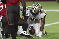 New Orleans Saints running back Alvin Kamara (41) scores on a 1-yard touchdown run against the Tampa Bay Buccaneers during the first half of an NFL football game Sunday, Nov. 8, 2020, in Tampa, Fla. (AP Photo/Mark LoMoglio)