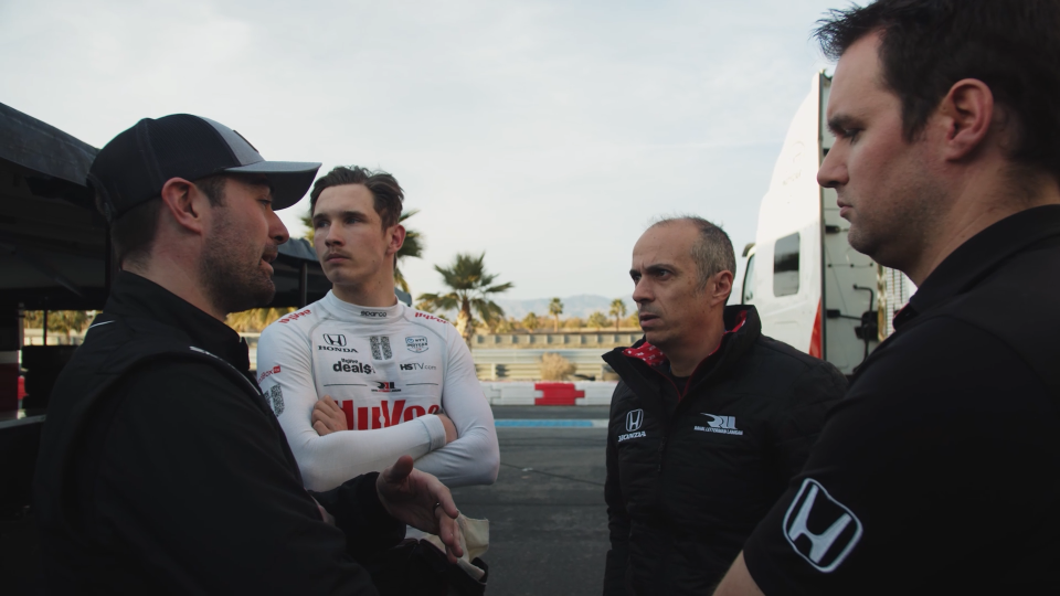 Stefano Sordo, pictured center-right, talks with RLL drivers Jack Harvey (far left) and Christian Lundgaard (center-left) during preseason testing at Thermal. Sordo joined RLL as its new technical director last September to bolster the performance of the team's engineering unit.