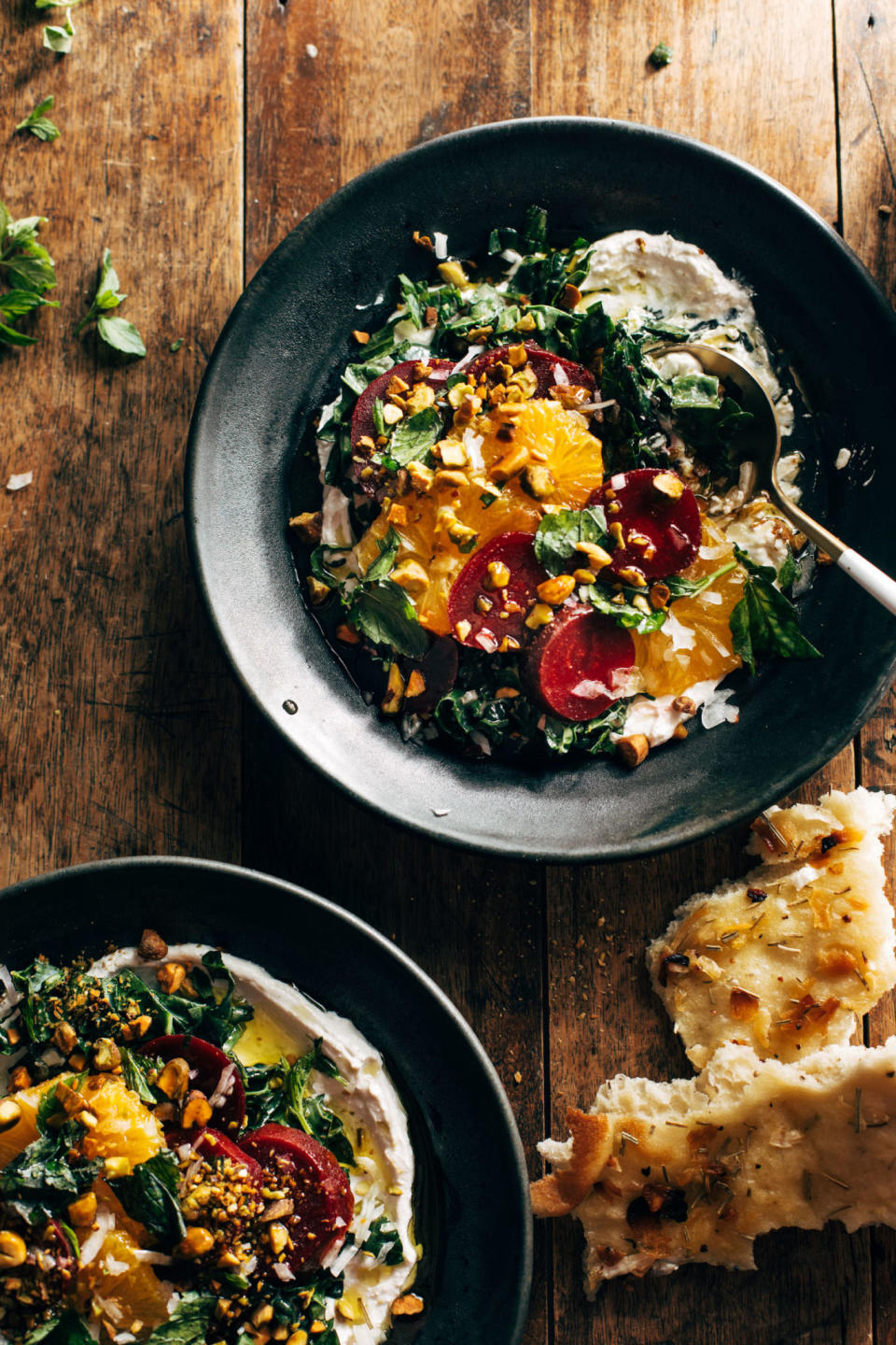 A beet salad with yogurt and kale.