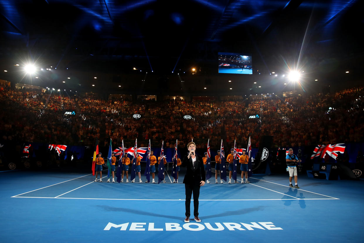 MELBOURNE, AUSTRALIA - JANUARY 26:  Beau Woodbridge sings the national anthem at the Australia Day Ceremony held on Rod Laver Arena on day 12 of the 2018 Australian Open at Melbourne Park on January 26, 2018 in Melbourne, Australia.  (Photo by Mark Kolbe/Getty Images)