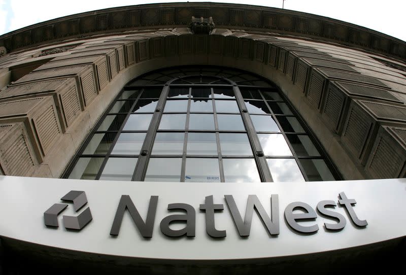 FILE PHOTO: Signage on a branch of NatWest Bank in central London