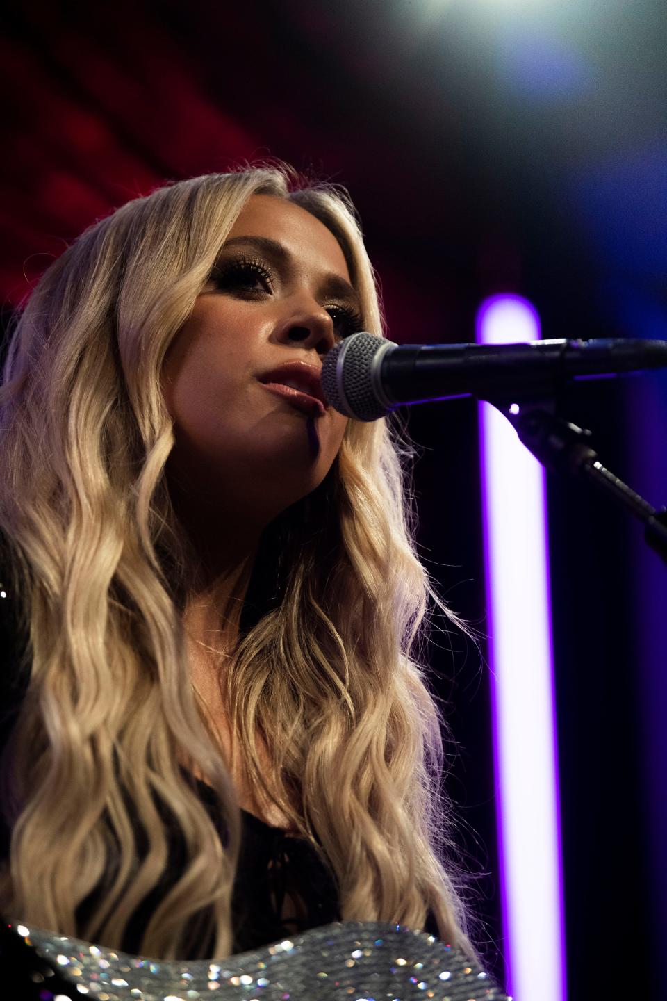 Megan Moroney performs her song, “Girl in the Mirror” during Nashville's Big Grammy party at Analog at Hutton Hotel in Nashville, Tenn., Wednesday, Jan. 24, 2024.