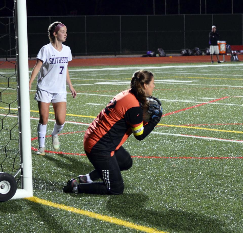 Smithsburg goalie Kayla Ward makes a save, as teammate Danica Radaker looks on, during the Leopards' 3-1 win over North Hagerstown at Mike Callas Stadium on Sept. 29, 2022.