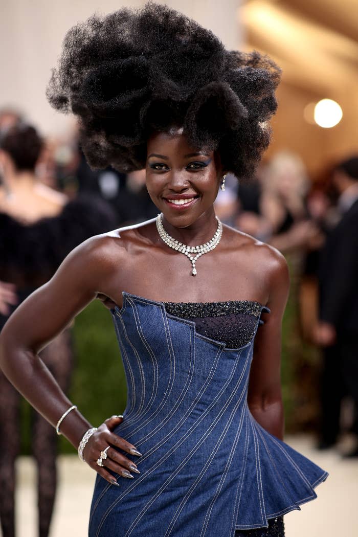 Lupita Nyong'o wearing a denim gown