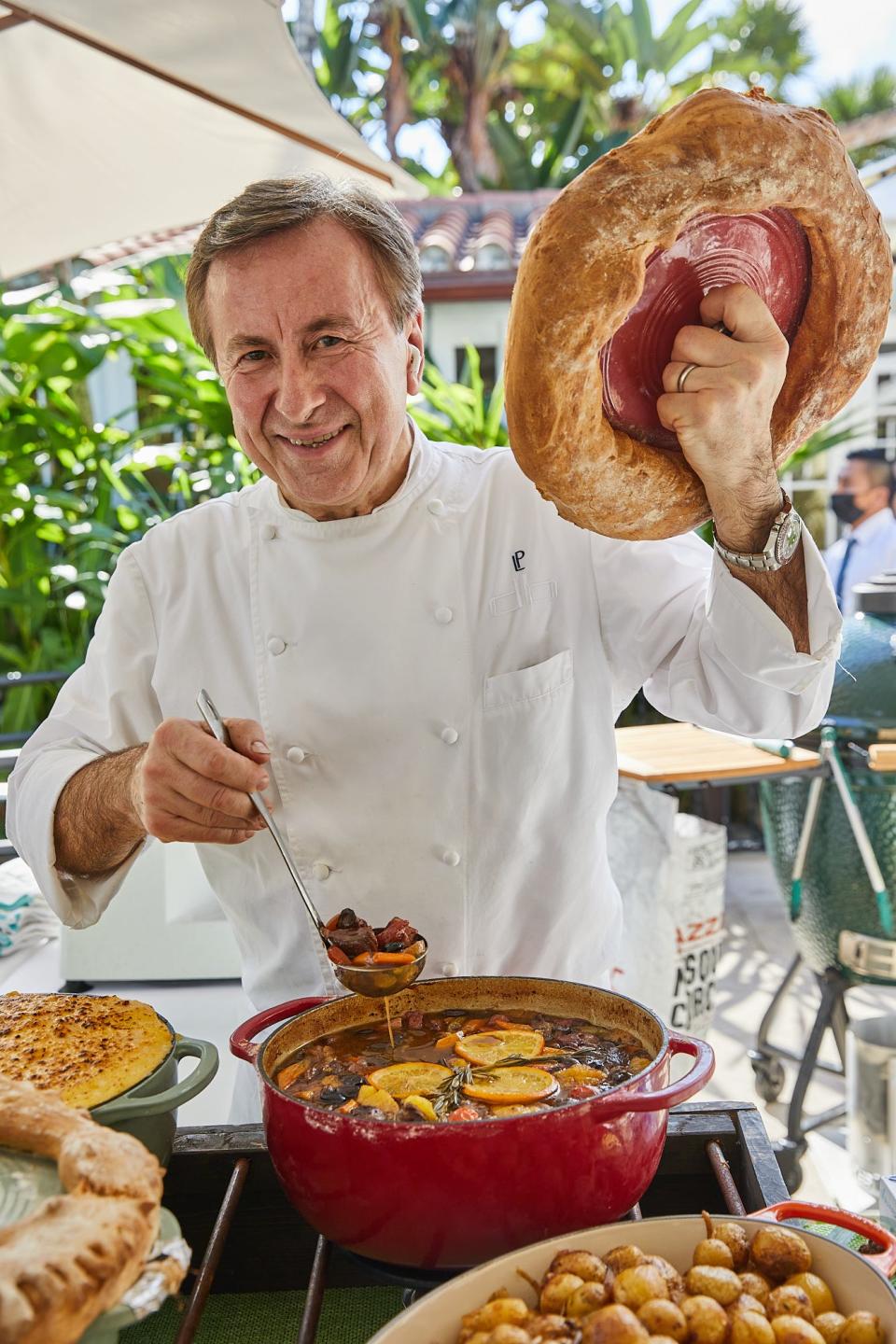 Daniel Boulud serves a country French stew during the 2021 Palm Beach Food and Wine Festival.