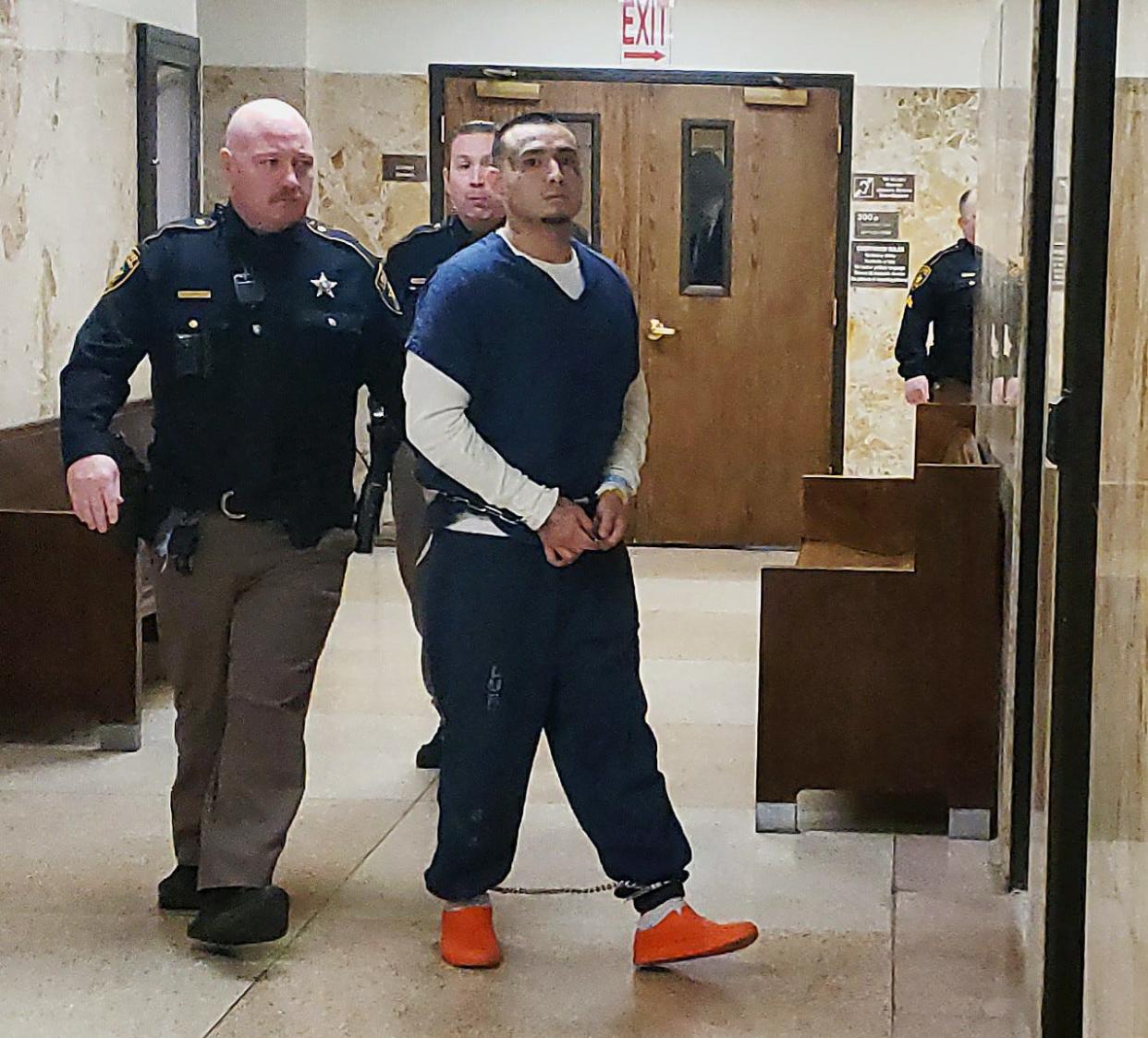 Isaiah Sanchez walks out of the 137th District Court where he was sentenced to 40 years in prison for the December 2020 shooting death of Monica Lumbrera.