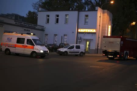 An ambulance is parked near the entrance of Bieganski hospital, where a man pending blood tests on whether he has the Ebola virus is hospitalized at, in Lodz October 13, 2014. REUTERS/Malgorzata Kujawka/Agencja Gazeta