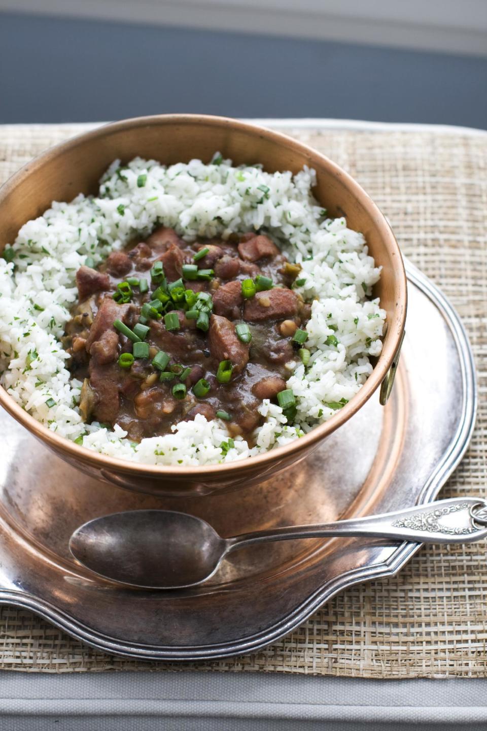 In this image taken on Jan. 28, 2013, red beans and rice with andouille sausage is shown served in a bowl in Concord, N.H. (AP Photo/Matthew Mead)