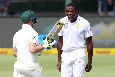 FILE PHOTO - Cricket - South Africa vs Australia - Second Test - St George's Park, Port Elizabeth, South Africa - March 9, 2018 South Africa’s Kagiso Rabada celebrates taking the wicket of Australia’s Steve Smith REUTERS/Mike Hutchings