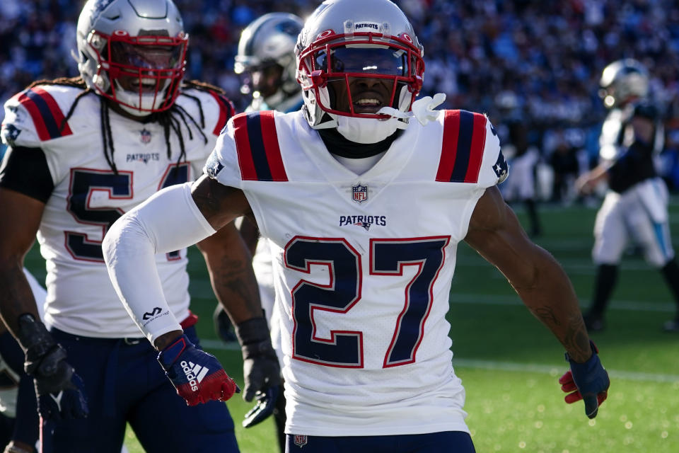 New England Patriots cornerback J.C. Jackson celebrates after an interception in the end zone during the second half of an NFL football game against the Carolina Panthers Sunday, Nov. 7, 2021, in Charlotte, N.C. (AP Photo/John Bazemore)