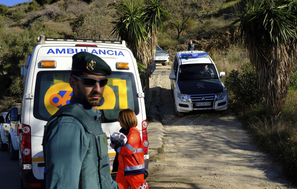 Emergency services look for a 2 year old boy who fell into a well, in a mountainous area near the town of Totalan in Malaga, Spain, Monday, Jan. 14, 2019. More than 100 firefighters and emergency workers in southern Spain are searching for a 2-year-old toddler who fell into a narrow and deep well on Sunday. Rescuers believe the boy fell into the 100-meter-deep well after walking away from his parents. (AP Photo/Gregorio Marrero)