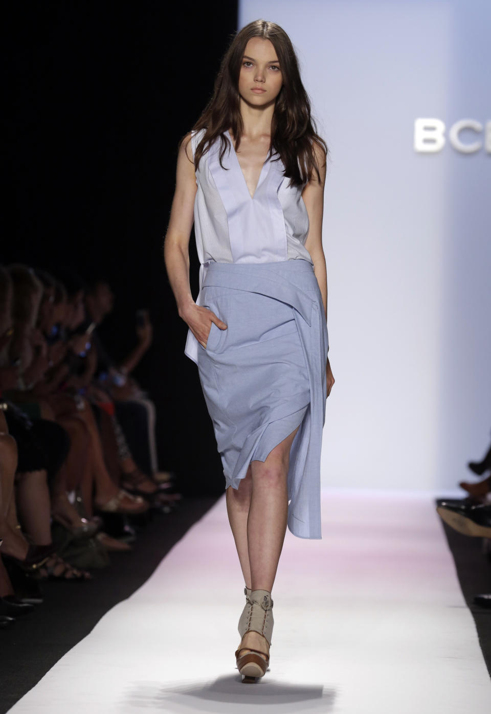 The BCBG MAX AZRIA Spring 2014 collection is modeled during Fashion Week in New York, Thursday, Sept. 5, 2013. (AP Photo/Richard Drew)