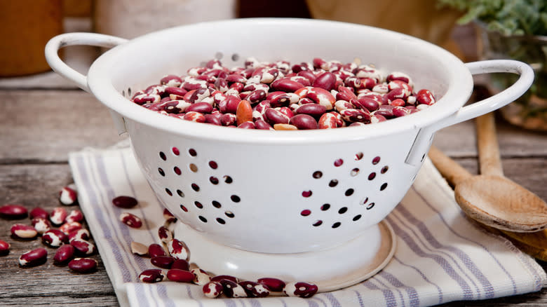 anasazi beans in white colander