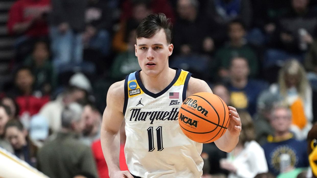 Marquette guard Tyler Kolek plays against Vermont in the first round of the NCAA Tournament in March.