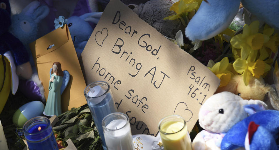 <span>A makeshift memorial grows outside the Crystal Lake home “AJ”. </span>Source: AP