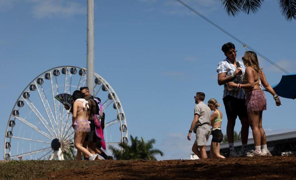 Festivalgoers take a break from the performances during Ultra Day 3 on Sunday, March 24, 2024, at Bayfront Park in downtown Miami.